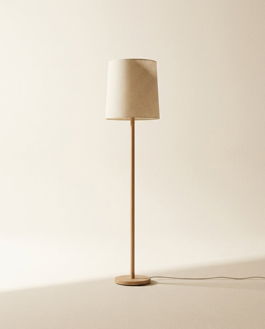 Suna floor lamp shown whole: oak frame, paper shade and cloth-covered cord